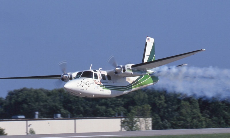 Bob Hoover performs a low-pass in his Shrike Commander. Photo source: EAA